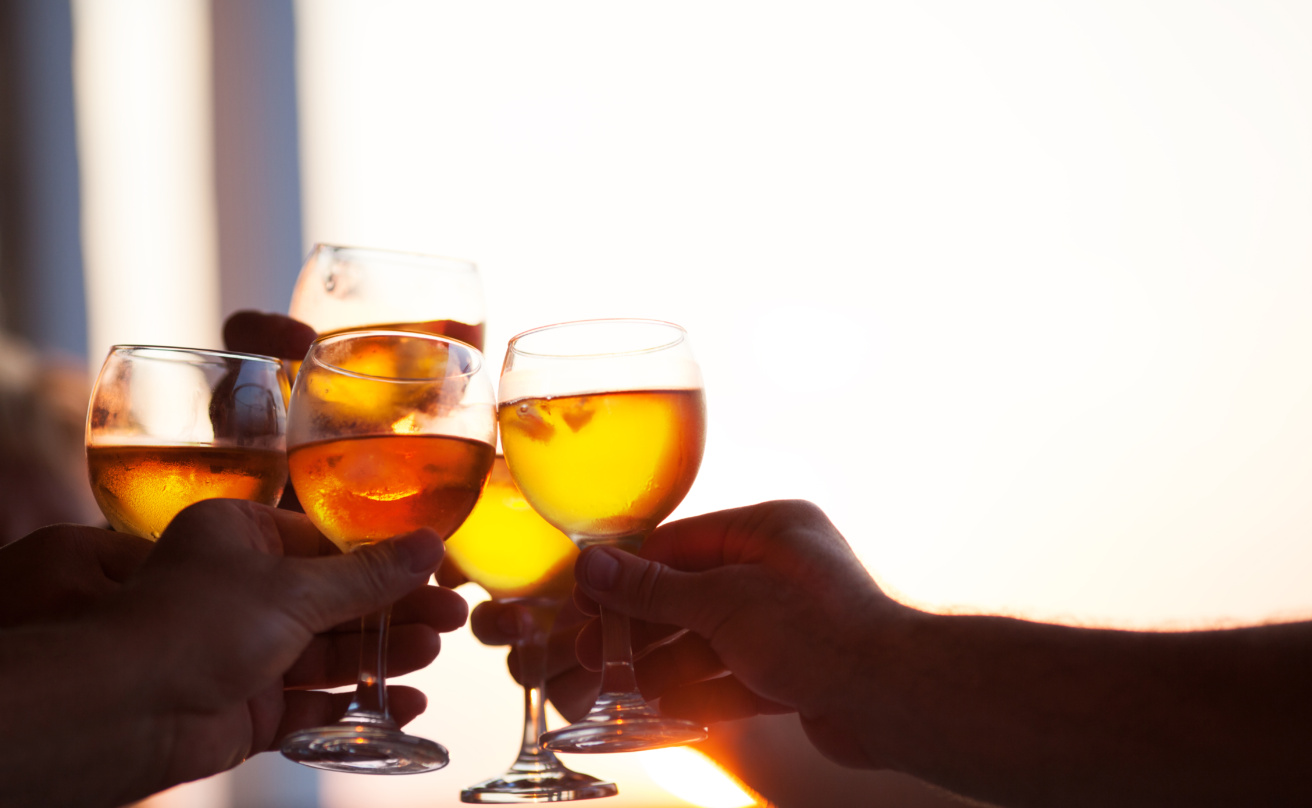 15808594-group-of-people-toasting-at-a-celebration-party.jpg
