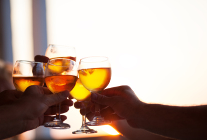 15808594-group-of-people-toasting-at-a-celebration-party.jpg