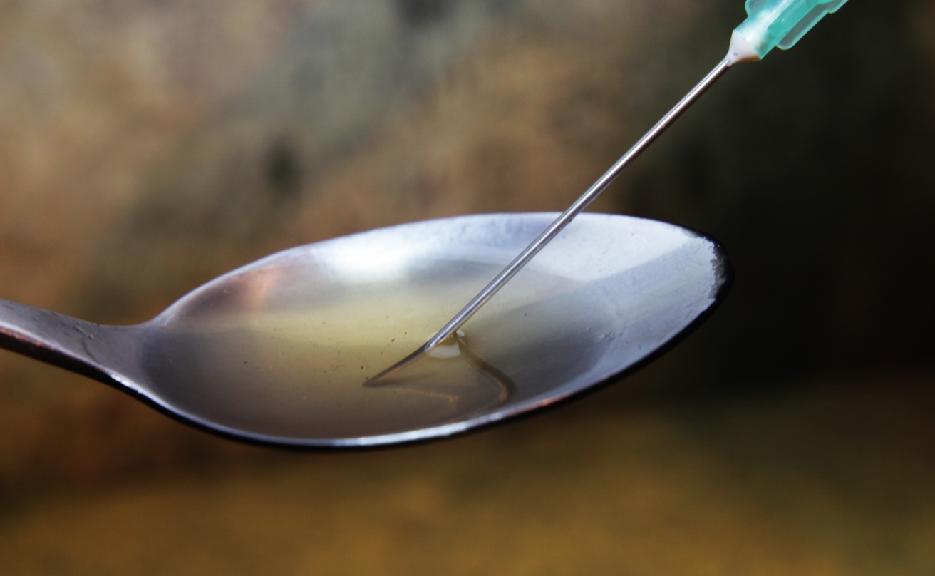 Drug and syringe