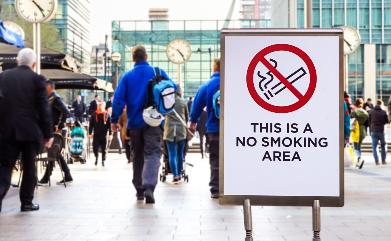 LONDON, ENGLAND – APRIL 25: Signal no smoking area. There are several non-smoking areas in the canary wharf district of london. There is growing sensitization to quit smoking . Selective focus