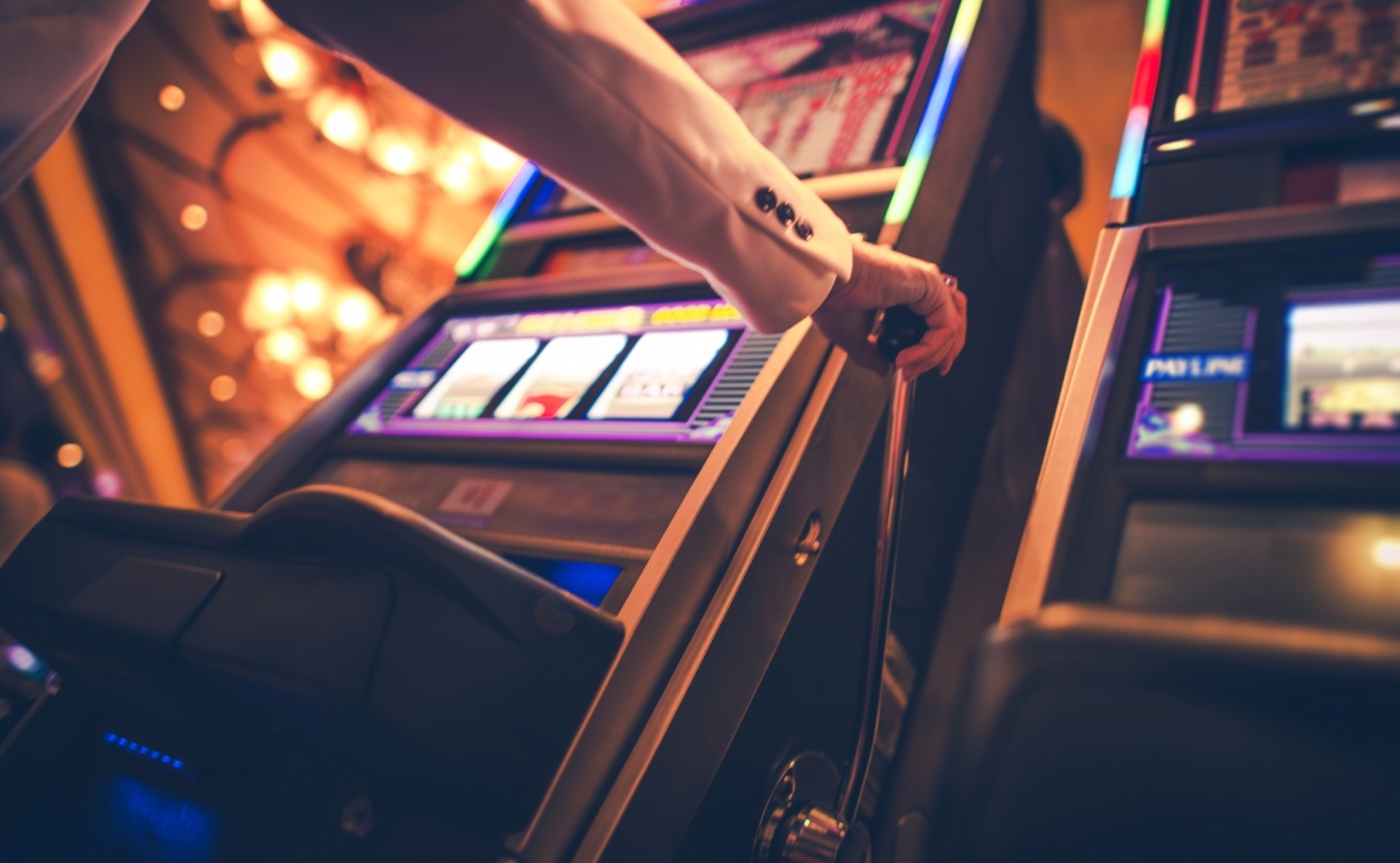Slot machine player at a casino