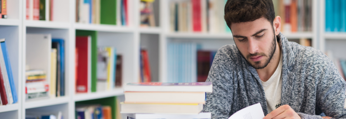 student reading in library