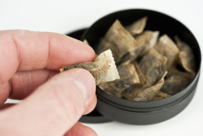 Grabbing  a pinch of snuff