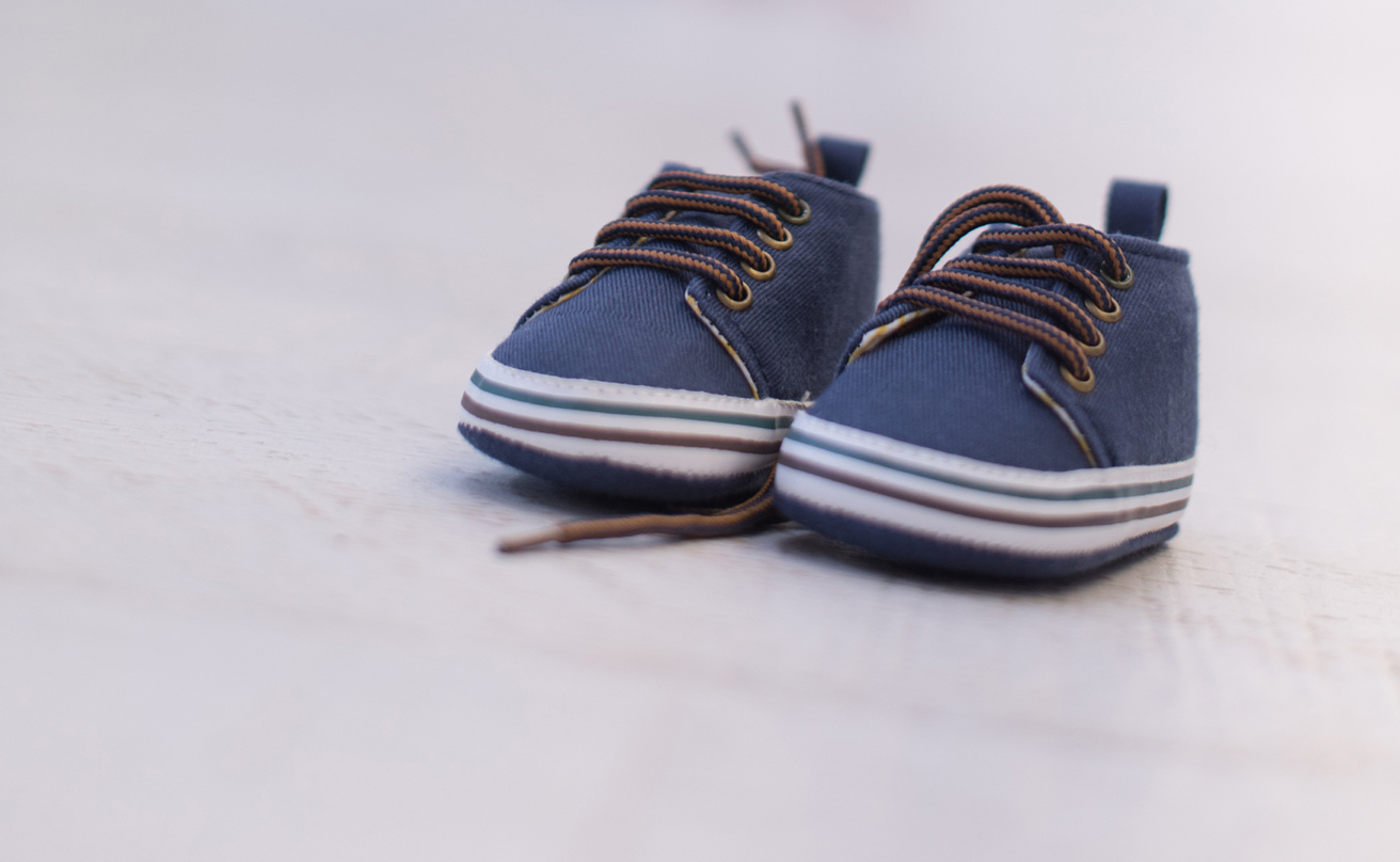 pair of blue baby shoes