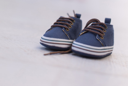 pair of blue baby shoes