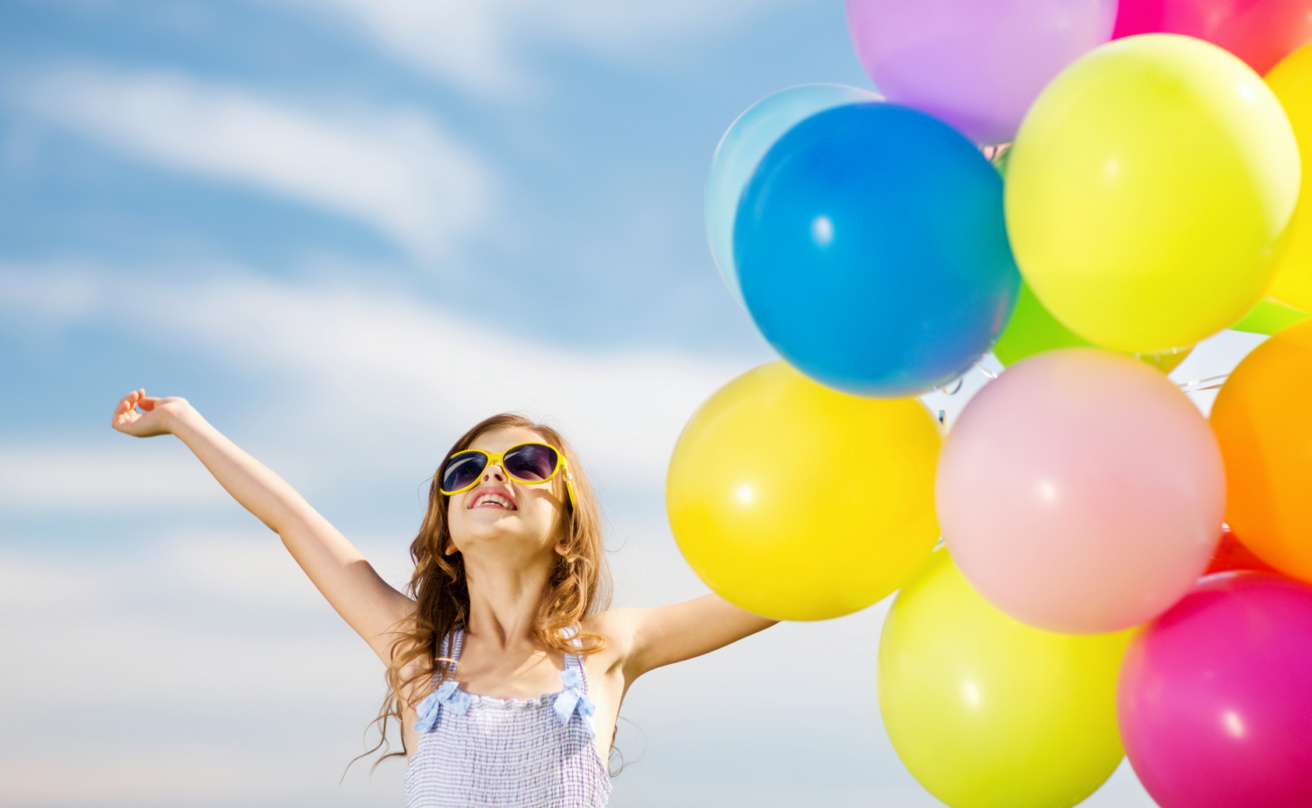 7912219-happy-girl-with-colorful-balloons