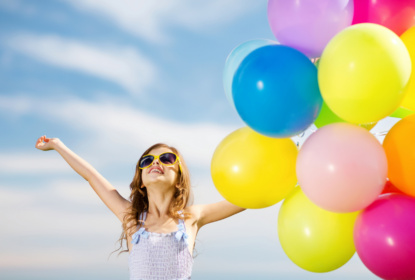 7912219-happy-girl-with-colorful-balloons