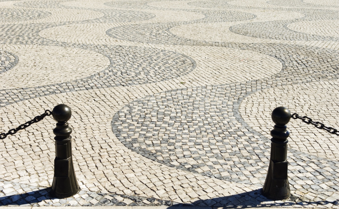 Lisbon details in cobblestone plaza