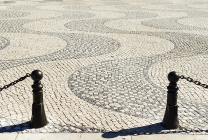 Lisbon details in cobblestone plaza