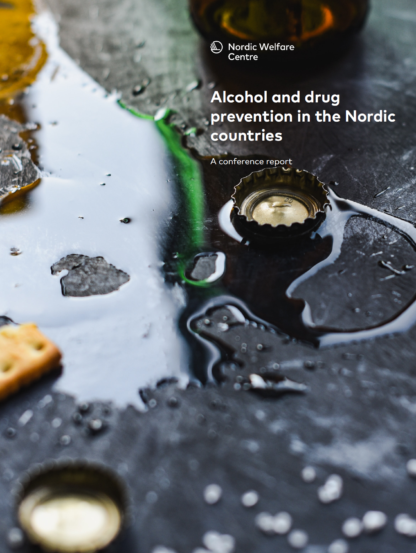 Cover of the report. A bottle cap on the ground in a puddle of water.