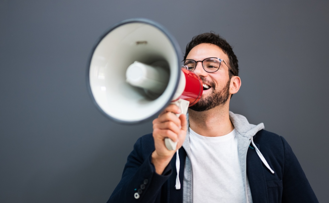 43202055-man-hand-holding-megaphone