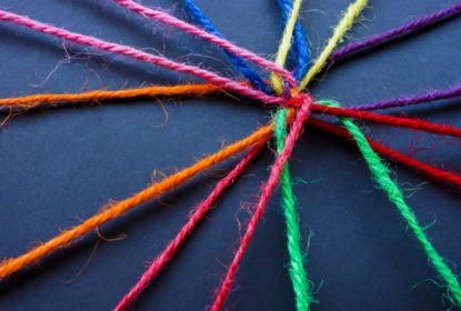 Connected colored threads as a concept of unity