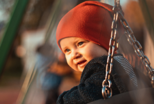 Toddler on swing