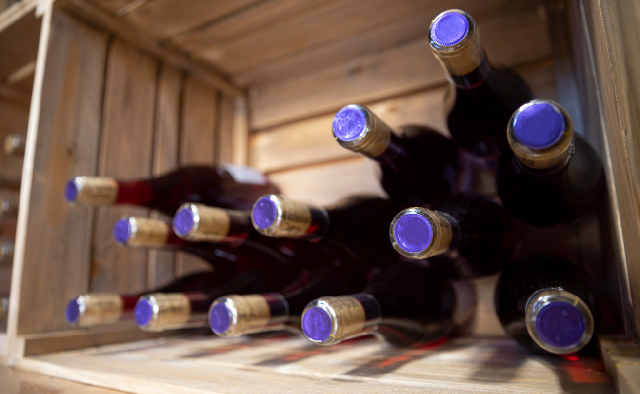 mp63725235-bottles-of-wine-in-a-winery