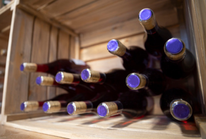 mp63725235-bottles-of-wine-in-a-winery