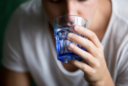 mp29120408-close-up-of-man-drinking-still-water