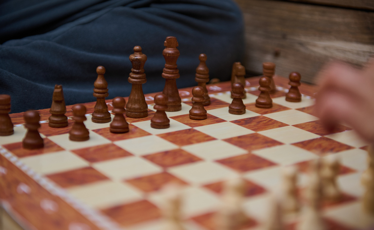mp65479609-close-up-of-a-chessboard-during-a-strategic-game-with