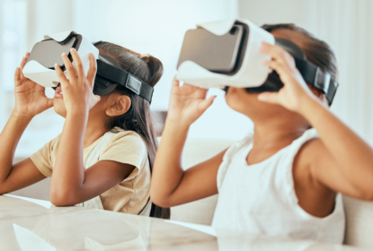 Two girls in VR glasses.