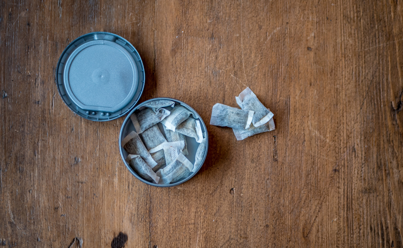 snus on wood background