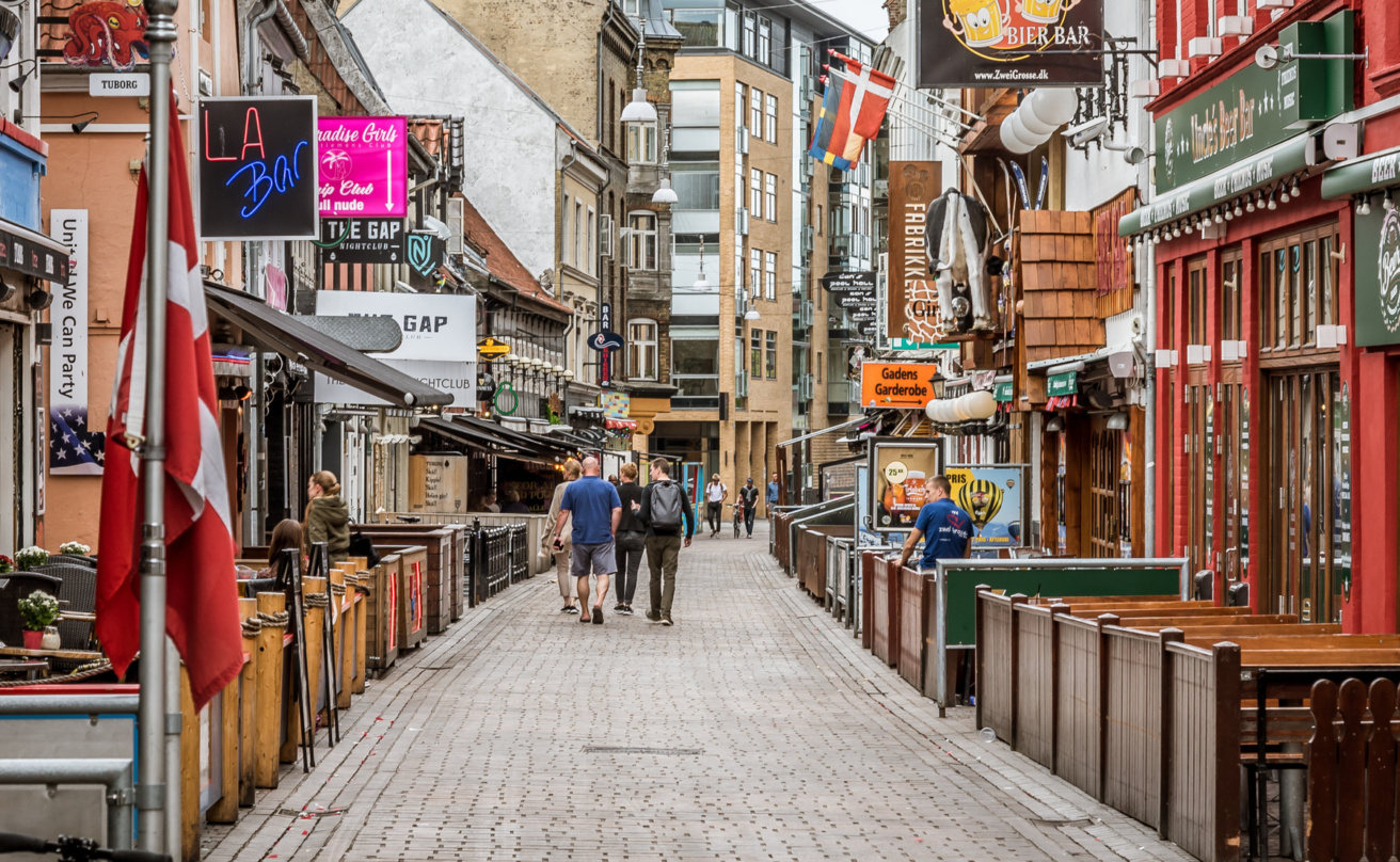 mp32301541-people-walking-among-pubs-and-bars-in-jomfru-anne-gade