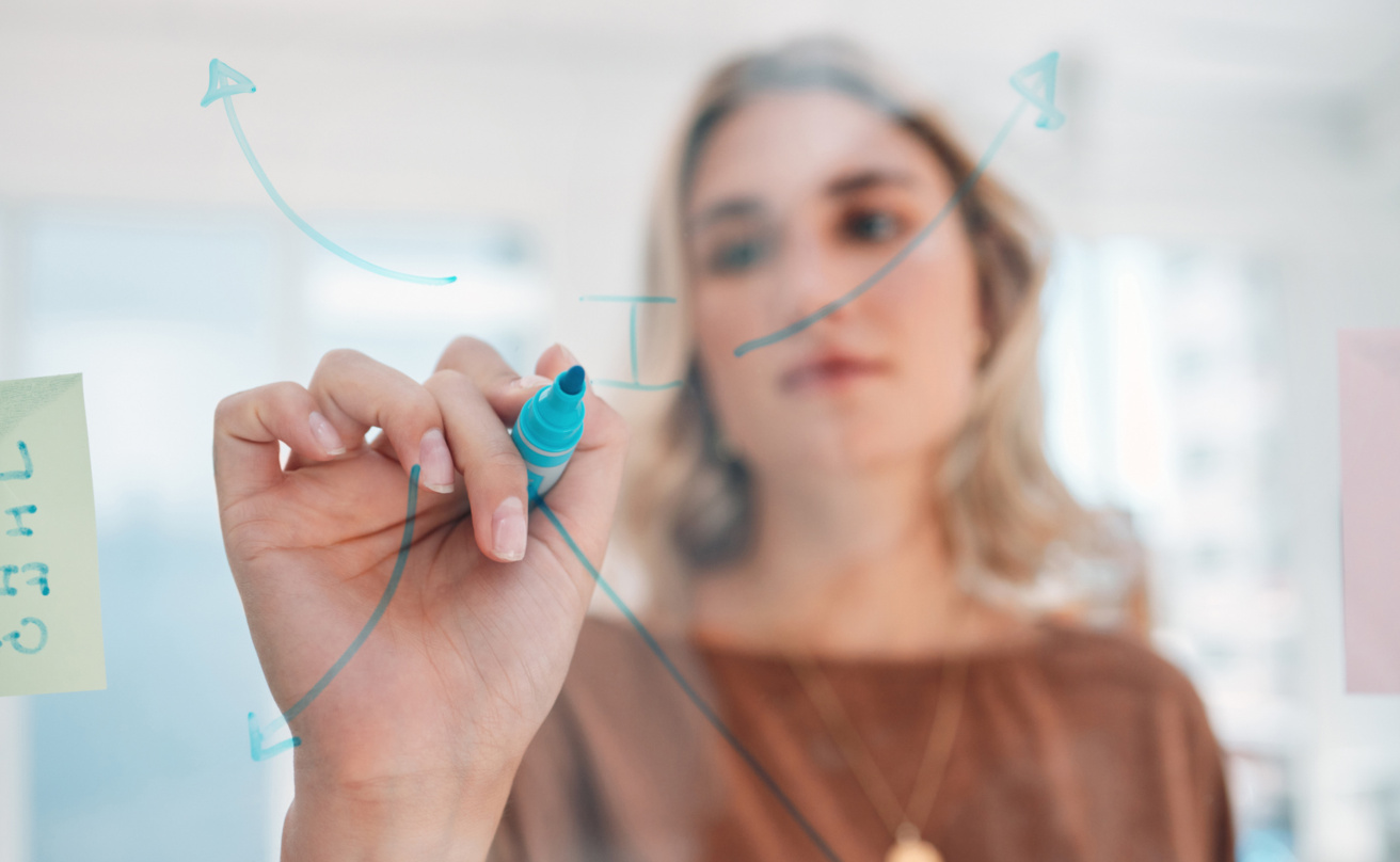 mp60842127-strategy-idea-and-woman-writing-on-glass-board-with-blue