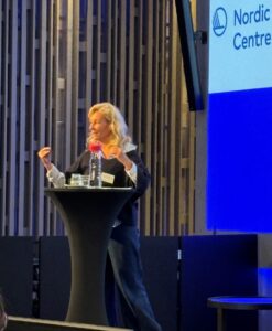 Monica Johansson presenting in Helsinki