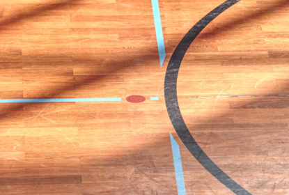 playfield-lines-painted-on-renewal-gymnasium-wooden-floor.