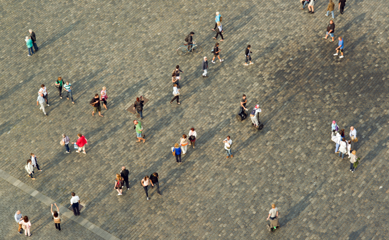 people walking in different directions