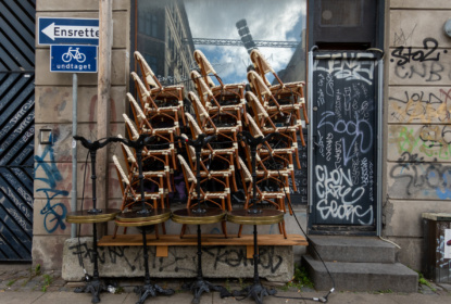 Chairs stacked outside a bar in Vesterbro