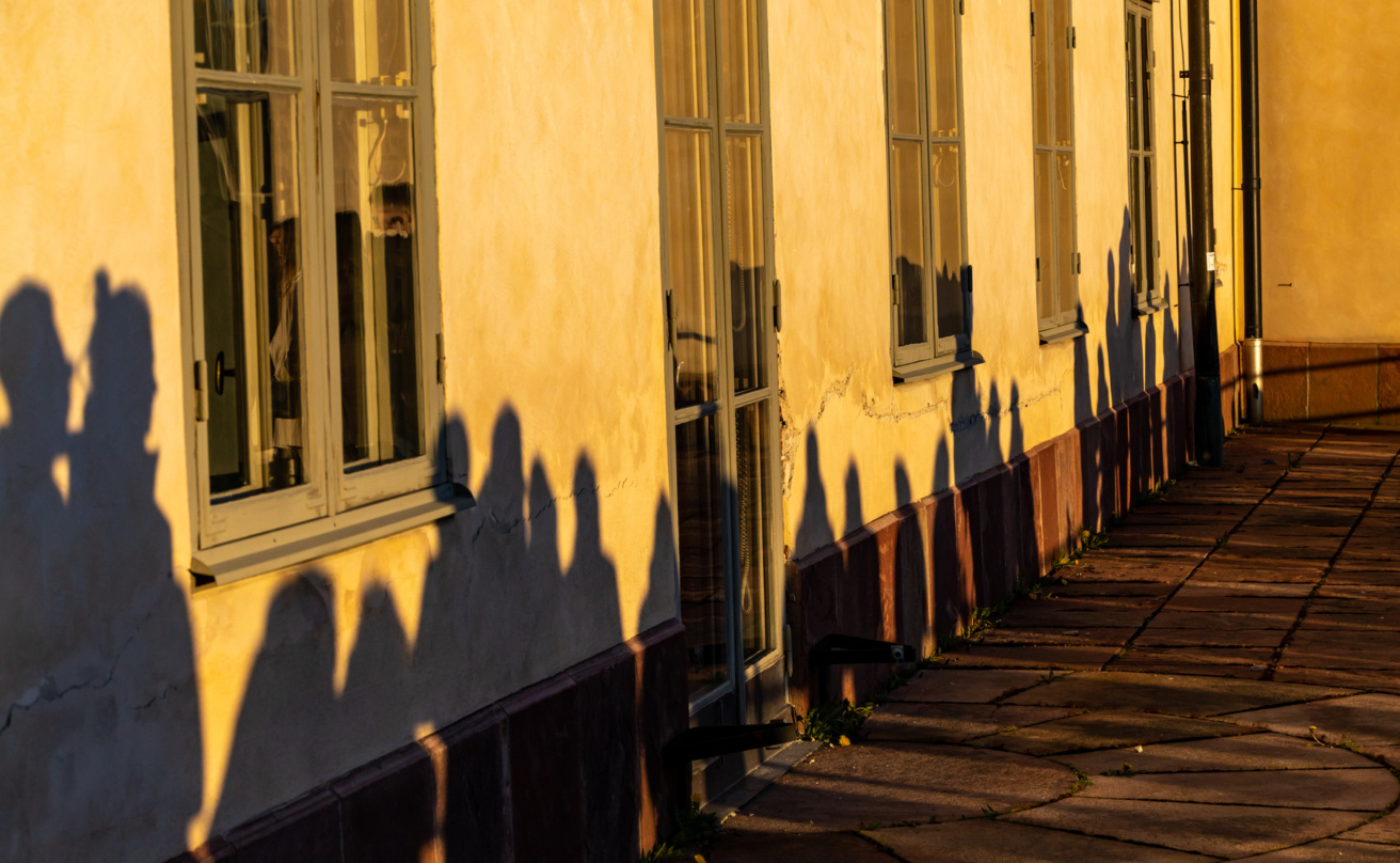 Shadows on a yellow wall