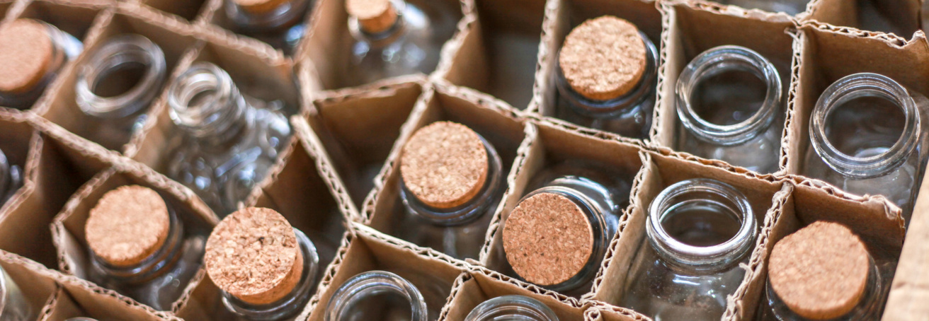 bottles in a cardboard box seen from above